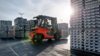 A Linde diesel forklift truck transports goods at an automotive supplier’s plant.