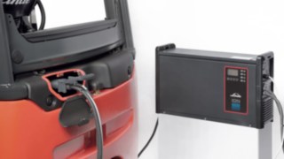 E-truck connected to the Li-ION battery charger E-truck connected to the Li-ION battery charger