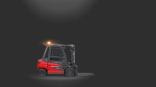 Flashing warning light in use on a counterbalance forklift truck. Flashing warning light in use on a counterbalance forklift truck.