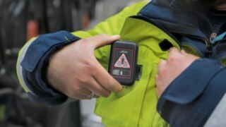 DB Schenker employees wear the Linde Safety Guard Portable Unit