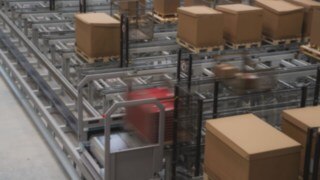 View of the in-floor conveyor and transported goods