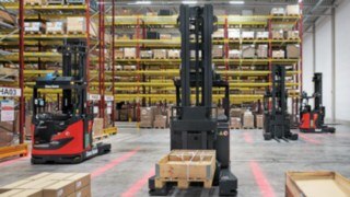 The R-MATICs from Linde MH wait in front of the rack for their next driving assignment.