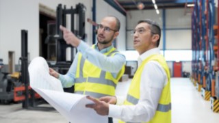 Experts from Linde Material Handling in action at Yanmar Compact Equipment Europe. Experts from Linde Material Handling plan Yanmar Compact Equipment Europe’s new logistics centre.