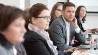 Linde employees listen to lecture Linde employees listen to lecture
