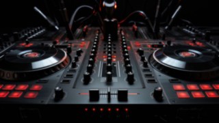 Mixing console with red illuminated buttons