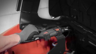 Operator charges an electric forklift from Linde