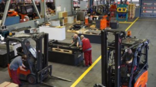 Engineer working on certified used forklift